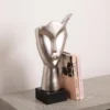 FIGURKA-DEKORACYJNA-srebrna-ksztalt-twarzy-czarna-podstawa-designerski-styl