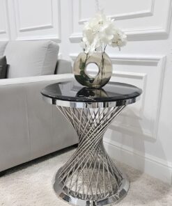STOLIK POMOCNICZY Emporio Silver okrągły, na srebrnej, błyszczącej zakręconej podstawie, czarny blat z konglomeratu marmurowego, designerski styl